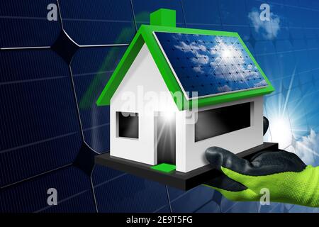 Nahaufnahme einer Hand mit schützendem Arbeitshandschuh, der ein kleines Modellhaus mit Solarzellen auf dem Dach und im Hintergrund zeigt. Konzept für erneuerbare Energien. Stockfoto