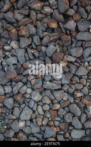 Die Textur des Steinkieses in verschiedenen Farben. Stockfoto