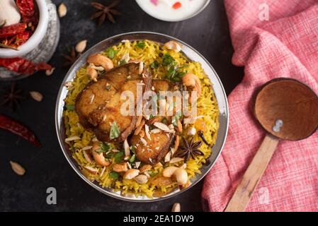 Fisch Biryani. Würziger indischer Malabar biryani oder Hydrabadi biryani, Dum Biriyani, Fisch und Reis. Pulao Basmati Reis, würzige gemischte Reisgericht mit Fleisch Stockfoto