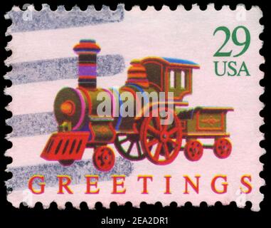 USA - UM 1992: Eine in den USA gedruckte Briefmarke zeigt die Toy Locomotive, Weihnachtsserie, um 1992 Stockfoto