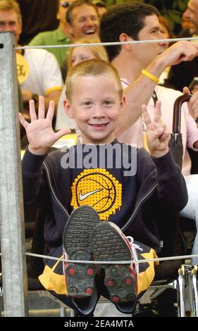 Lance Armstrong's Sohn Luke während der 21st und letzten Etappe des Tour de France Radrennens 92nd zwischen Corbeil-Essonnes und Paris auf den Champs Elysees in Paris, Frankreich, am 24. Juli 2005. Foto von Bruno Klein/ABACAPRESS.COM. Stockfoto