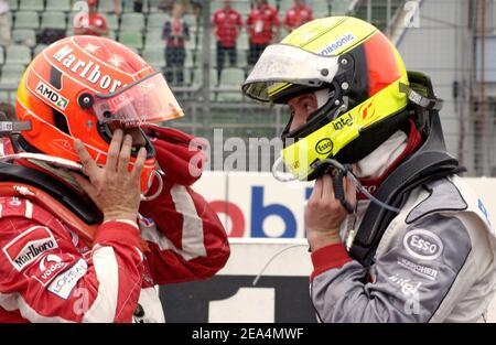 Die Schumacher-Brüder Michael (l.) und Ralph beim Großen Preis von Deutschland am 24. Juli 2005 in Hockenheim. Foto von Thierry Gromik/ABACAPRESS.COM Stockfoto