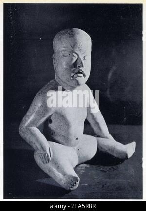 Art mexicain.Figur maskulin,à tête déformée et gravée dans la Partie inférieure.traits d'enfant.Position assise,les mains sur les genoux et l Stockfoto