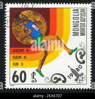 MONGOLEI - UM 1980: Briefmarke gedruckt von der Mongolei, zeigt Läufer, um 1980 Stockfoto