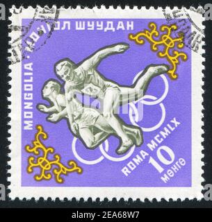 MONGOLEI - UM 1960: Briefmarke gedruckt von der Mongolei, zeigt Läufer, um 1960 Stockfoto