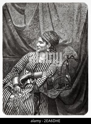 Elegante Syrerin. Damaszener Frau in traditioneller Kleidung des 19th. Jahrhunderts, Syrien. Alte 19th Jahrhundert gravierte Illustration von El Mundo Ilustrado 1879 Stockfoto