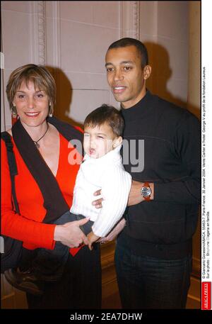 © Giancarlo Gorassini/ABACA. 55463-7. Paris-Frankreich. Januar 2004 30. Vente Cartier a l'Hotel George V au Profit de la fondation Laureus. Sur la photo : Stephane Diagana en famille. Stockfoto