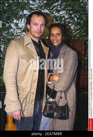 © Laurent Zabulon/ABACA. 56737-8. Paris-Frankreich, 3. März 2004. Der Schweizer Schauspieler Vincent Perez und seine Frau Karine Sylla nehmen an der Eröffnungsfeier der neuen Galerie Lafayette Maison, rue Scribe in Paris Teil. Stockfoto