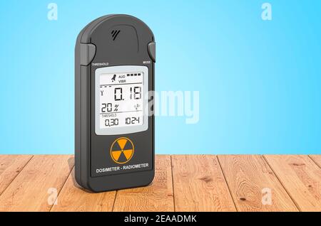 Gammastrahlung Persönliches Dosimeter auf den Holzbohlen, 3D Rendering Stockfoto