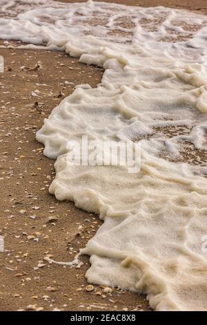 Spray auf Romoe Beach Stockfoto