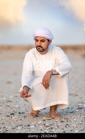 emiratian an einem Strand in den Vereinigten Arabischen Emiraten Stockfoto