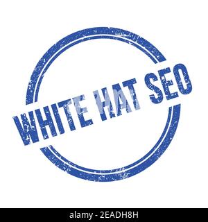 WHITE HAT SEO Text geschrieben auf blau grungy vintage runde Stempel. Stockfoto