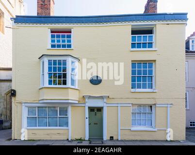 Das kleine Stadthaus, in dem die Schriftstellerin Jane Austen 1817 starb, und Gedenktafel in College Street, Winchester, Hampshire, Südengland, Großbritannien Stockfoto