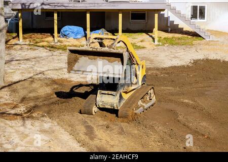 Der Bulldozer bewegt Bodengräberbaugeräte Stockfoto