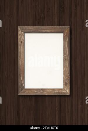 Alte rustikale Holzbilderrahmen hängen auf einem dunklen Holz Wand Stockfoto