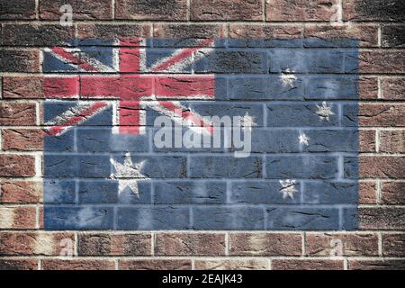 Australien Flagge auf einem Backstein Wand Hintergrund Stockfoto