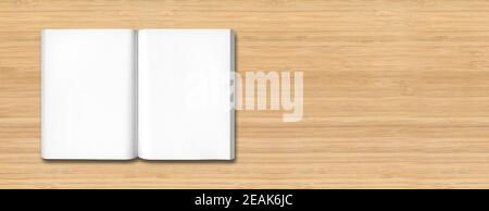 Offenes Buch isoliert auf Holzbanner Stockfoto