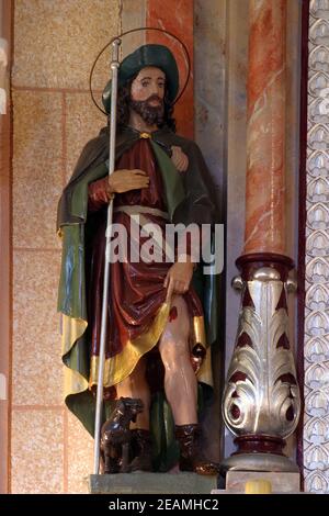 Saint Roch, Statue auf dem Altar des Heiligen Josef in der Kirche der Heiligen Barbara in unhöflich, Kroatien Stockfoto