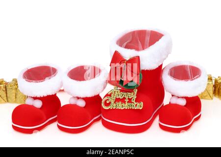 Stiefel des roten Weihnachtsmanns mit Copyspace isoliert auf weißem Hintergrund Stockfoto