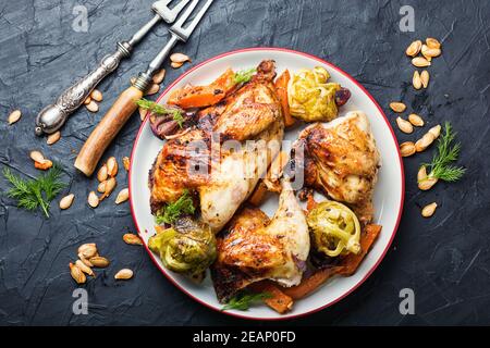 Geröstetes Rebhuhn mit Kürbis Stockfoto