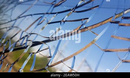 Nahaufnahme der Risse auf dem Glas eines Angezeigt Stockfoto