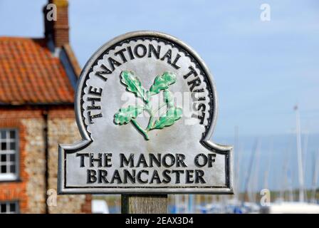 National Trust Zeichen für das Herrenhaus von Brancaster, Norfolk, England Stockfoto