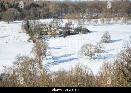 Farm in den cotswolds im Schnee. Cotswolds, Gloucestershire, England Stockfoto