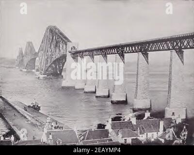 Vintage-Foto der Firth of Forth Brücke in Schottland. Ikonische Brücke mit Häusern im Vordergrund. Stockfoto