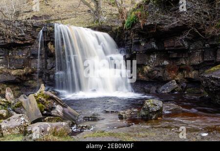 Winteransicht von East Gill Force ein Wasserfall in Swaledale Im Yorkshire Dales National Park Stockfoto