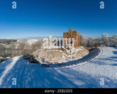 Luftaufnahme von Norham Castle, die Wache über dem Fluss Tweed steht ein beliebtes Thema von Turner, die viel von seinem Ruhm zu ihm zugeschrieben. Stockfoto