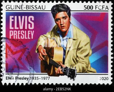 Elvis Presley spielt Gitarre auf Briefmarke Stockfoto