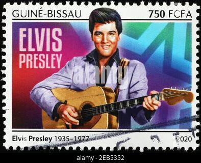 Elvis Presley mit Gitarre auf Briefmarke Stockfoto