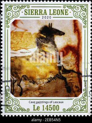 Pferd in Höhlenmalereien von Lascaux auf Briefmarke Stockfoto