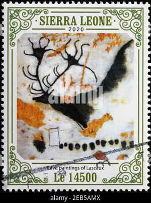 Hirsch in Höhlenmalereien von Lascaux auf Briefmarke Stockfoto