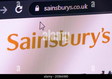 Nahaufnahme des Bildschirms mit dem Sainsbury-Logo und Cursor Stockfoto