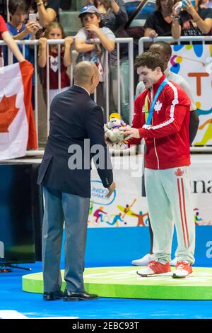 Toronto Panam Games 2015: Medaillenzeremonie für die Horizontale Bar in Gymnastik künstlerischen Männern. Erster Platz Jossimar Calvo Moreno aus Kolumbien, zweiter platz in der pla Stockfoto