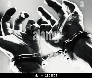 Handschellen Mann Handgelenke Stockfoto