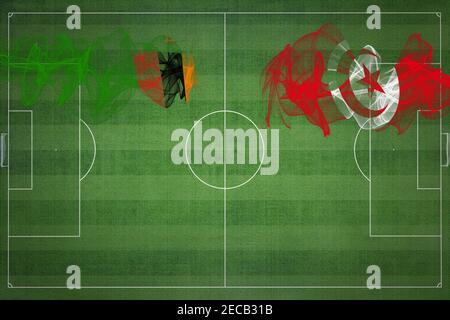 Sambia vs Tunesien Fußballspiel, Nationalfarben, Nationalflaggen, Fußballfeld, Fußballspiel, Wettbewerbskonzept, Kopierraum Stockfoto