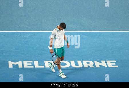 Melbourne, Australien. Februar 2021, 14th. Novak Djokovic reagiert während des 4th-Runden-Spiels der Männer zwischen Novak Djokovic aus Serbien und Milos Raonic aus Kanada beim Australian Open 2021 Tennisturnier in Melbourne Park, Melbourne, Australien, am 14. Februar 2021. Quelle: Bai Xuefei/Xinhua/Alamy Live News Stockfoto