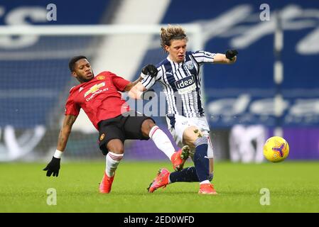 Fred von Manchester United fordert West Bromwich Albions Conor Gallagher während des Premier League-Spiels bei den Hawthorns in West Bromwich heraus. Bilddatum: Sonntag, 14. Februar 2021. Stockfoto