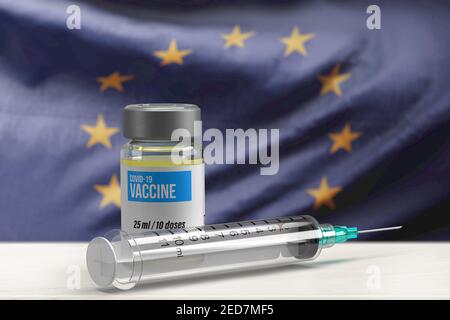 Nationales Covid-19-Impfstoffkonzept: 3D gerenderte medizinische Injektionsfläschchen und Spritze mit bewegter europäischer Flagge im Hintergrund. Länderwettbewerb Stockfoto