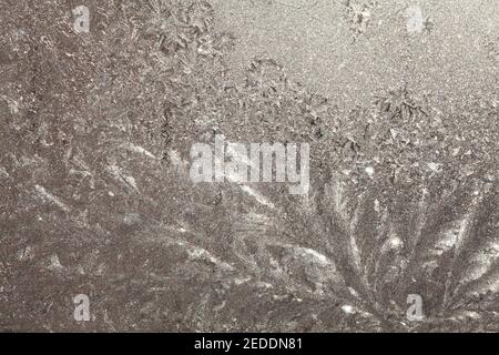 Frostmuster . Textur von Eis auf dem Glas Stockfoto