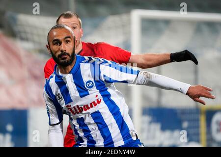 Odense, Dänemark. Februar 2021, 14th. Issam Jebali (7) von ob beim Superliga-Spiel 3F zwischen Odense Boldklub und Aarhus GF im Nature Energy Park in Odense. (Foto Kredit: Gonzales Foto/Alamy Live News Stockfoto