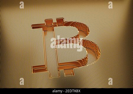 Ein goldenes Bitcoin-Symbol. Bitcoin das neue elektronische Gold-Konzept Stockfoto