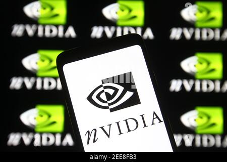 Ukraine. Februar 2021, 15th. In dieser Abbildung wird das Nvidia-Logo auf einem Smartphone und einem pc-Bildschirm angezeigt. Kredit: Pavlo Gonchar/SOPA Images/ZUMA Wire/Alamy Live Nachrichten Stockfoto