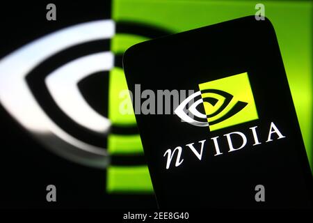 Ukraine. Februar 2021, 15th. In dieser Abbildung wird das Nvidia-Logo auf einem Smartphone und einem pc-Bildschirm angezeigt. Kredit: Pavlo Gonchar/SOPA Images/ZUMA Wire/Alamy Live Nachrichten Stockfoto
