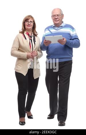 In vollem Wachstum. Casual Mann und Frau mit einem digitalen Tablet Stockfoto