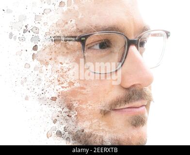 Ein kreatives Porträt eines Mannes mit Brille Stockfoto