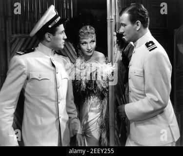 WILLIAM BAKEWELL MARLENE DIETRICH UND JOHN WAYNE IN SIEBEN SÜNDERN 1940 Regisseur TAY GARNET Produzent Joe Pasternak Miss Dietrichs Kleider Irene Universal Pictures Stockfoto