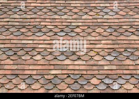 Club Dachziegel Textur, Fisch Skala Dachziegel auf einem Haus, scalloped Muster close up, Großbritannien Stockfoto